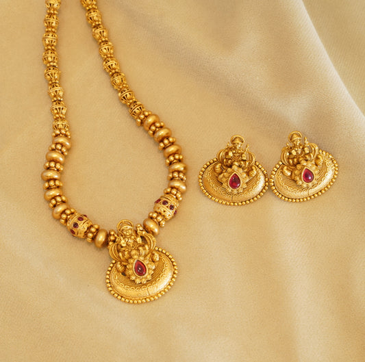 Divine Beaded Matte Finish Gold Plated Laxmi Pendant Traditional Temple Brass Necklace Set with Stud Earrings