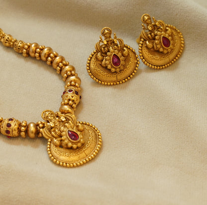 Divine Beaded Matte Finish Gold Plated Laxmi Pendant Traditional Temple Brass Necklace Set with Stud Earrings