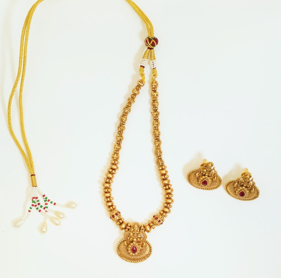 Divine Beaded Matte Finish Gold Plated Laxmi Pendant Traditional Temple Brass Necklace Set with Stud Earrings