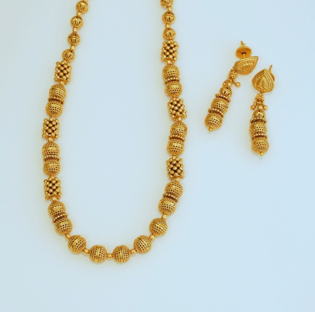 Multi sized and shaped High Gold Beaded Traditional Necklace Set with Beaded Dangler Earrings in Brass