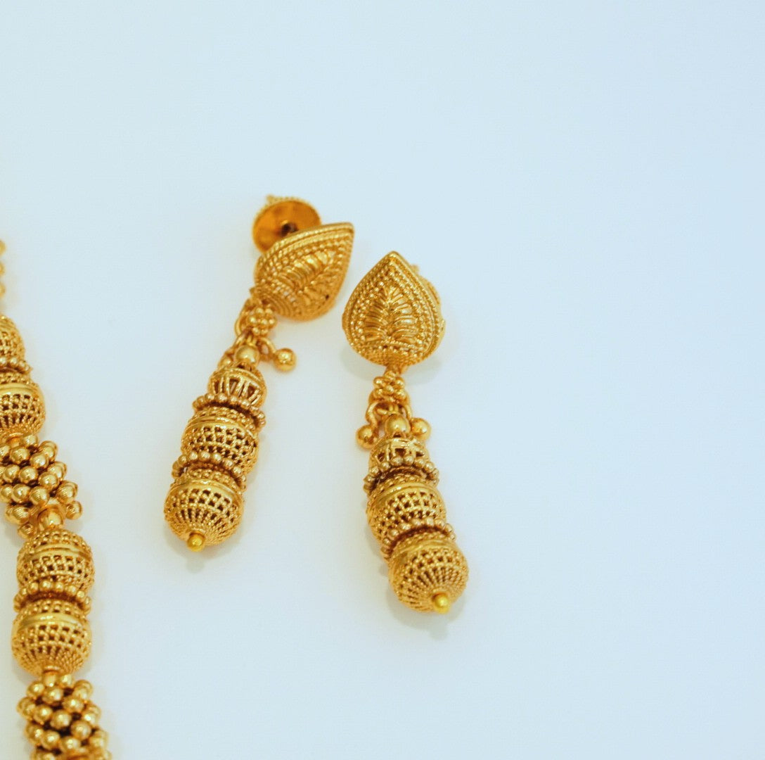 Multi sized and shaped High Gold Beaded Traditional Necklace Set with Beaded Dangler Earrings in Brass