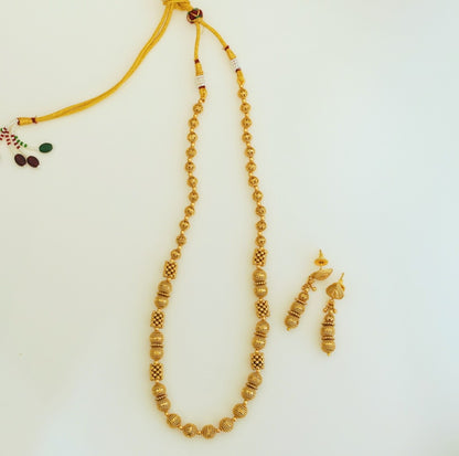 Multi sized and shaped High Gold Beaded Traditional Necklace Set with Beaded Dangler Earrings in Brass