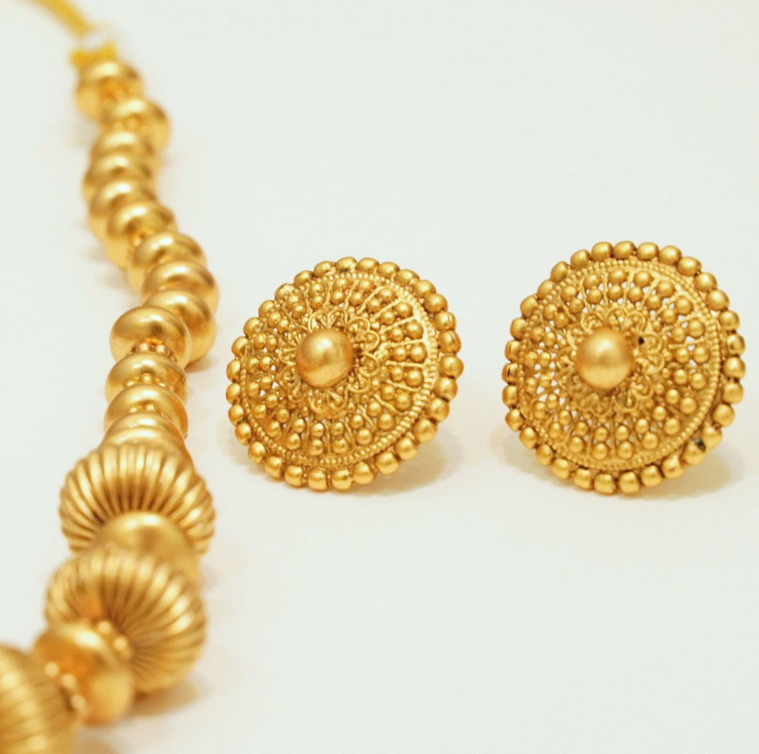 Oval Slope Down Beaded High Toned Brass Matte Finish Gold plated Necklace Set with Stud Earrings