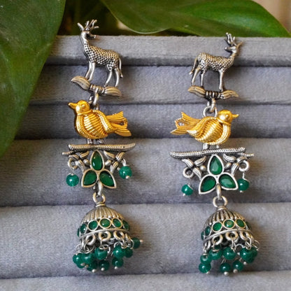 Striking Green Jaipuri Stone n Ornate Deer-Bird Design Dual toned Oxidized Jhumka Earrings