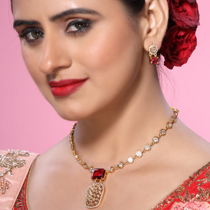 Indo-Western Cum Traditional Brass Pendant Chain Necklace Set Studded with Zirconia, Crystals and Statement Bold Red Crystal with Stud Earrings