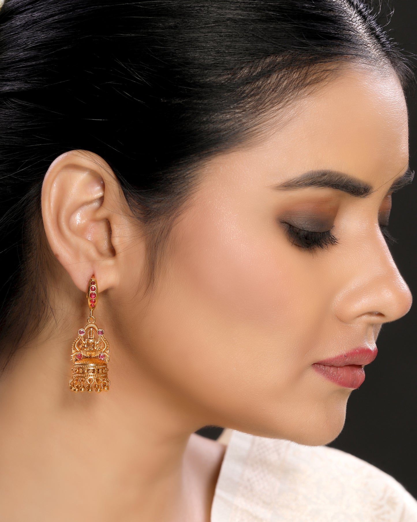 Ruby-Studded Linear Laxmi Temple Jhumka Earrings 22KT Gold Plated Brass Matte Finish