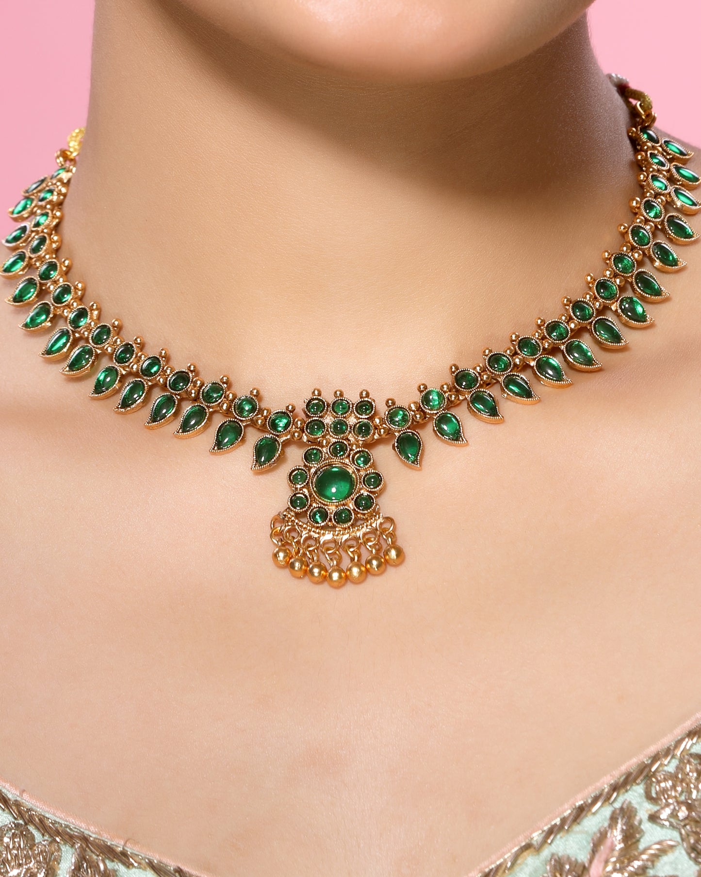 Green Kemp Stone Studded Leafy Pattern Brass Alloy Matte Gold Plated Traditional Necklace Set with Stud Earrings