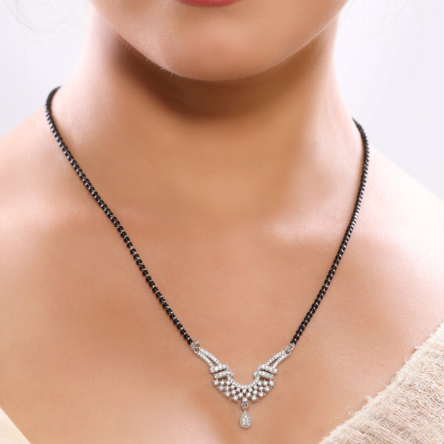 Trendy Checkered Pattern American Diamond Studded Drop Pendant Linear Beaded Single Chain Mangalsutra