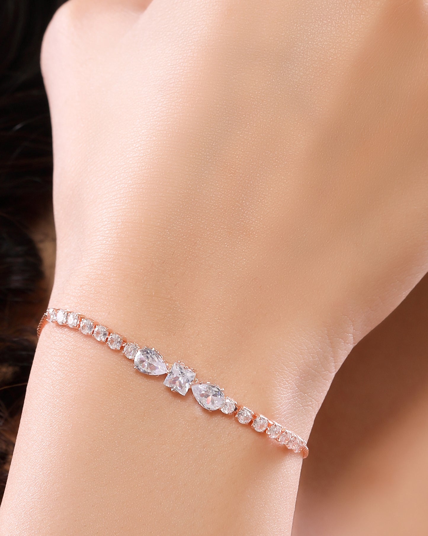 Crystal and Zirconia Studded Linear Chain Bracelet in Rose Gold Plated Stainless Steel