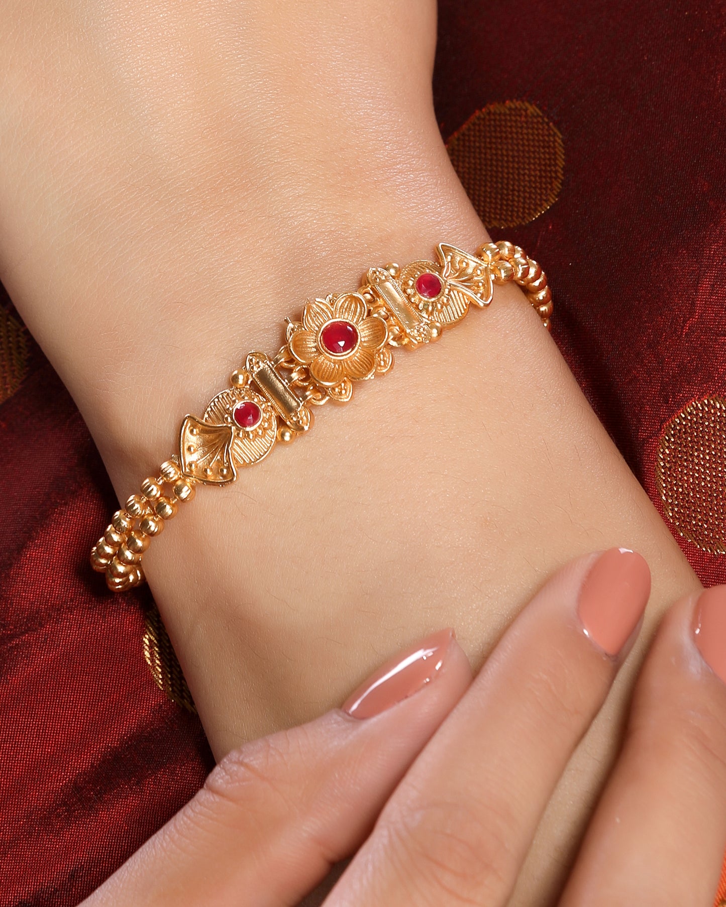 Ethnic and Graceful Matte Finish Gold Plated Brass Alloy Linear Chain Floral Traditional Bracelet