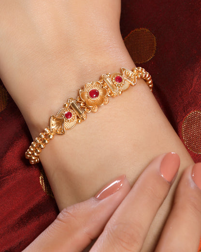 Ethnic and Graceful Matte Finish Gold Plated Brass Alloy Linear Chain Floral Traditional Bracelet