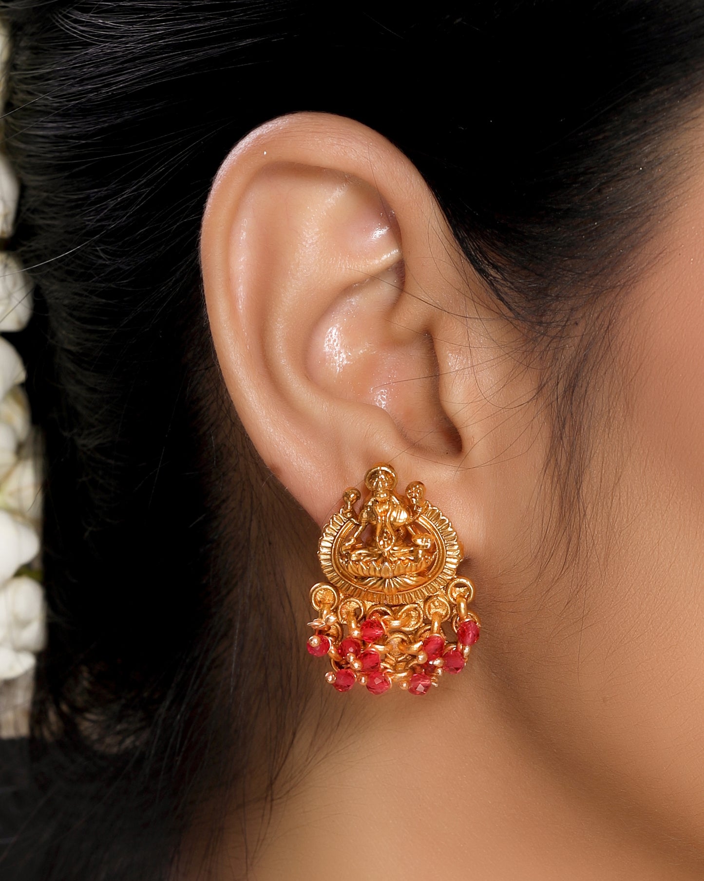 Divine Traditional Temple Laxmi Brass Studs studded with Red Crystal Beads in 22KT Gold Plated Matte Finish