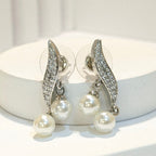 DIVA SERIES - Rhodium Plated Leaf Shaped Studded Zirconia with Pearl drops Earring