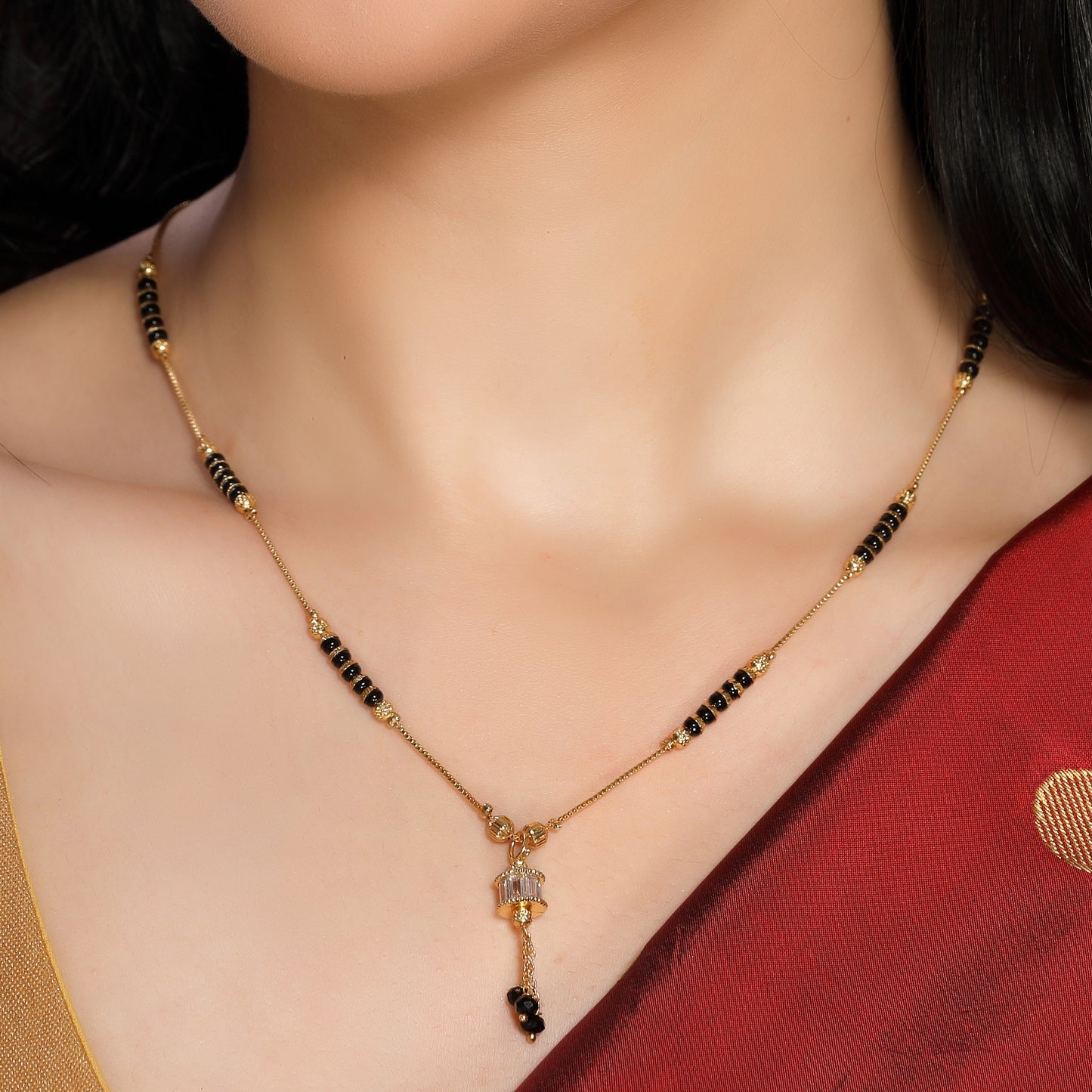 Trendy Minimal Gold Plated Crystal Studded Cylindrical Pendant in Single Layer Black n Golden Beads Chain Mangalsutra