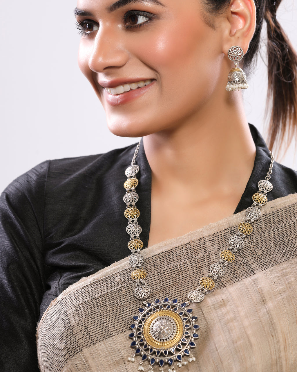 Dual-Tone German Silver Necklace Set with Blue Stone Pendant & Jhumka Earrings