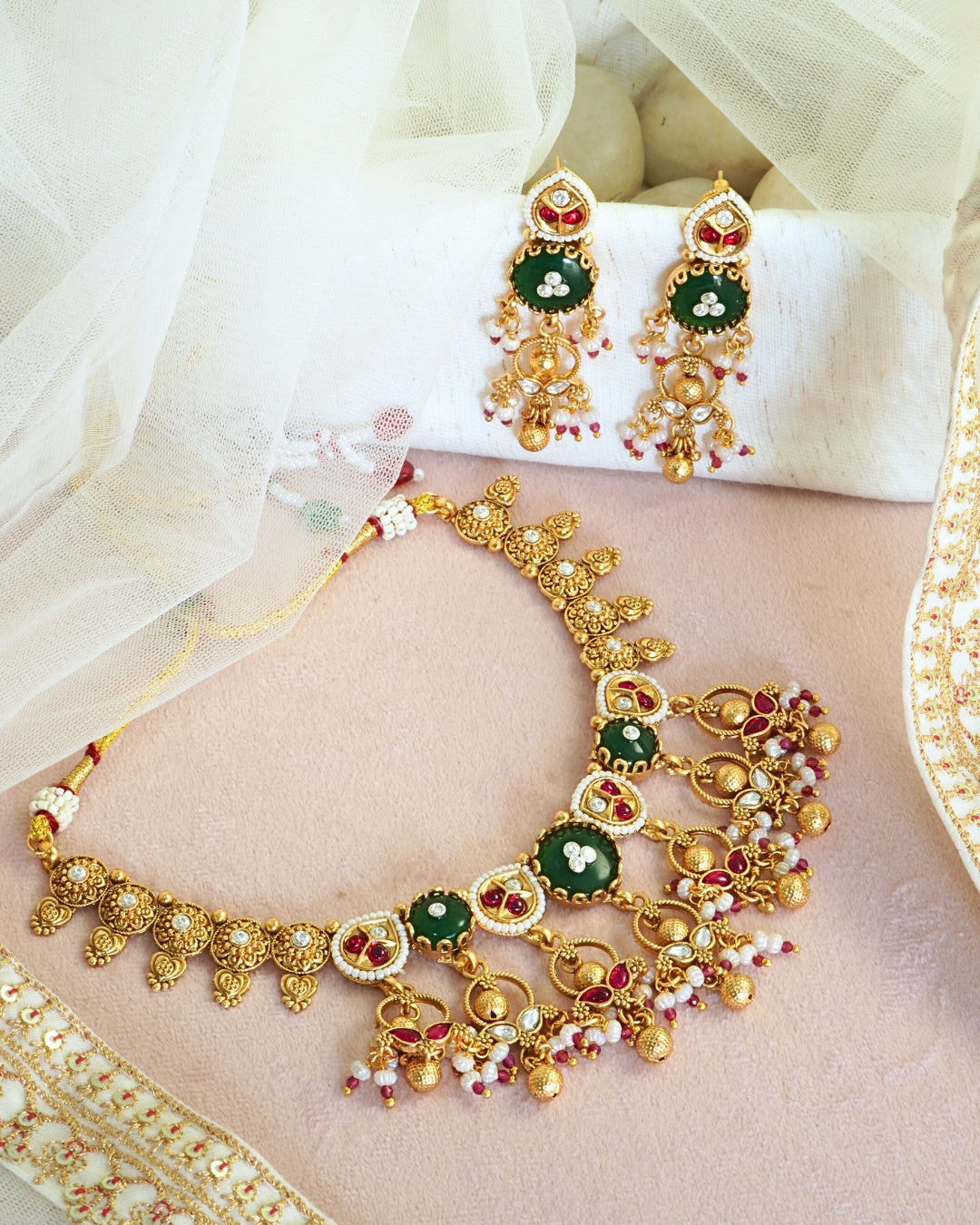 Traditional Emerald Studded Gold-Toned Beaded Necklace Set