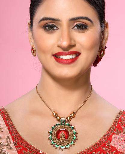 Red and Green Kemp Stone Studded Laxmi Traditional Temple Necklace set with Stud Earrings in Brass Alloy Matte Gold Finish