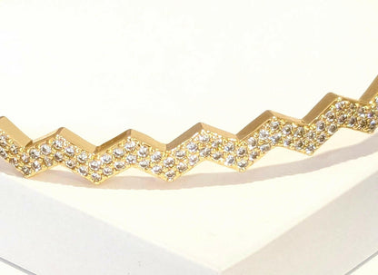 Sleek Golden Bracelet studded with fine American Diamonds