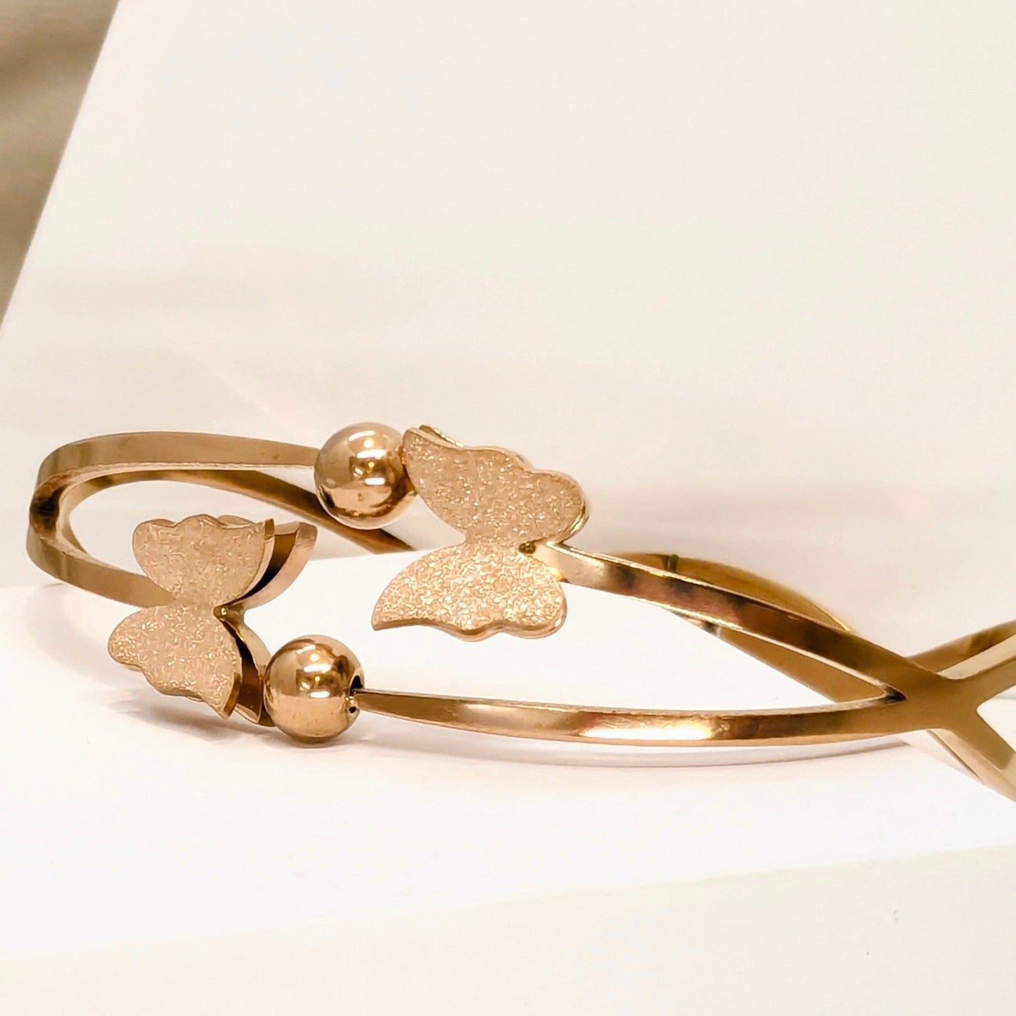 Double Line Wavy Crossed Butterfly Bracelet - Rose Gold