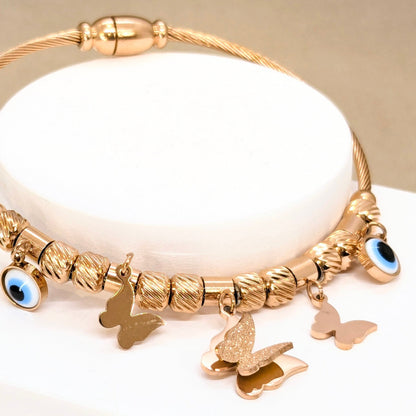 Elegant Rose Gold Bracelet with Evils Eye and Butterfly Charms