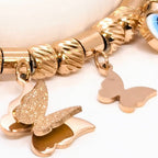 Elegant Rose Gold Bracelet with Evils Eye and Butterfly Charms