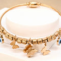 Elegant Rose Gold Bracelet with Evils Eye and Butterfly Charms