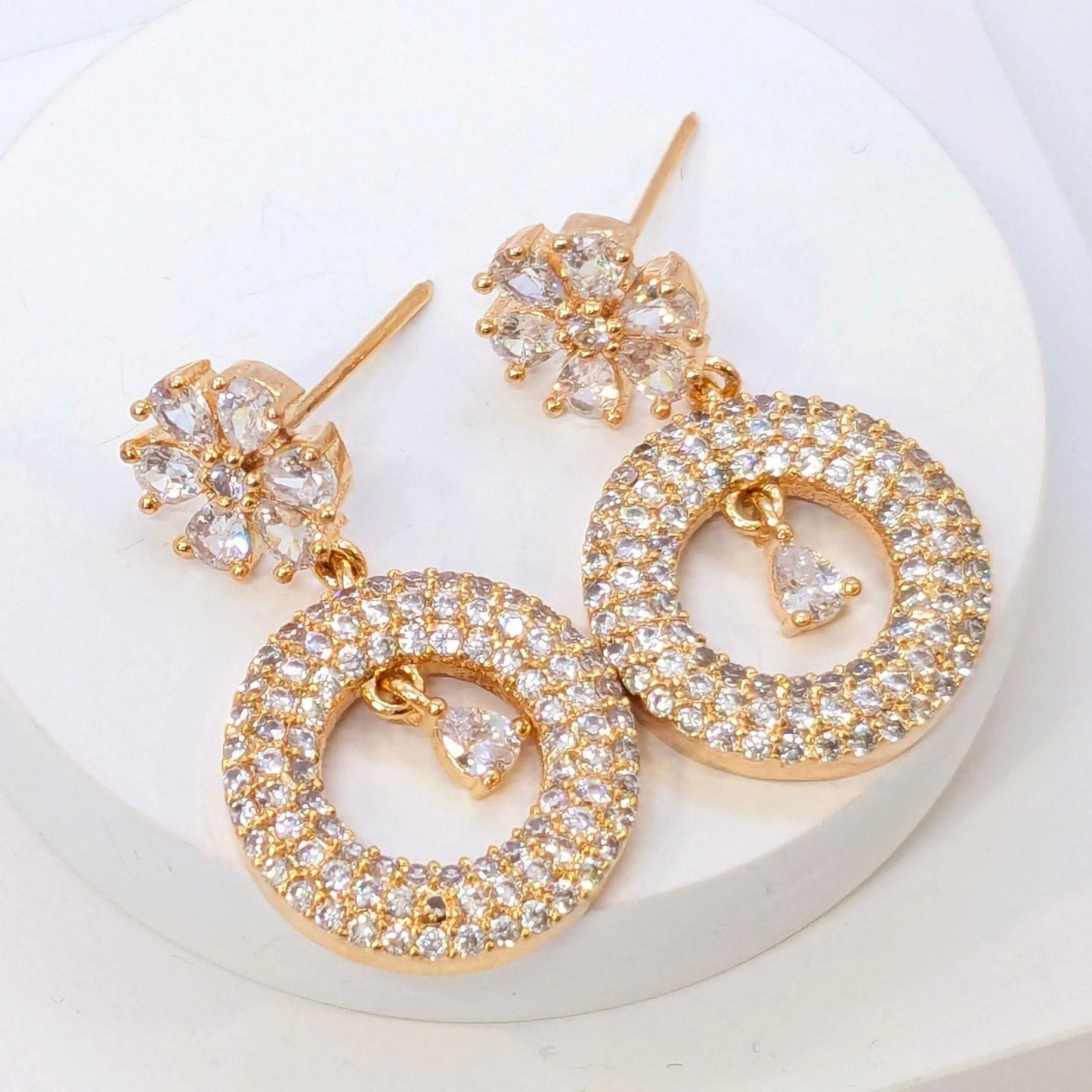 Hanging Circular Studded with American Diamonds with Flower Base Earrings