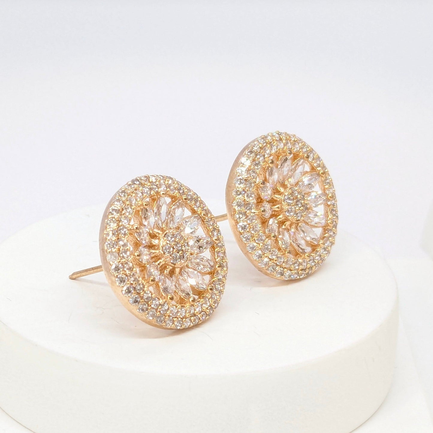 American Diamond Studded Earrings - Round Shape With Gold Finish.