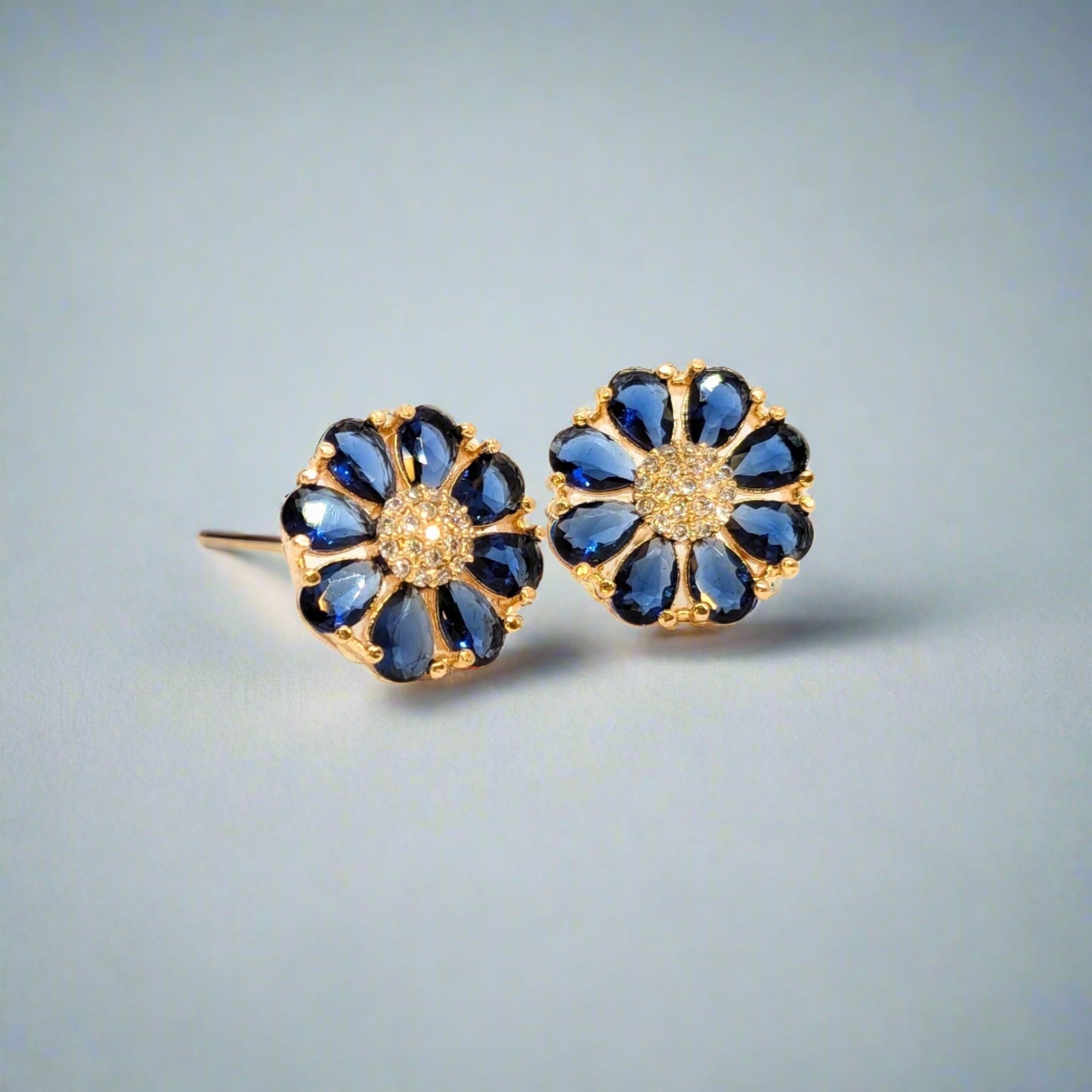 Fine Cut Navy Blue Stone Earring - Flower Pattern Studded with AD - Gold Finish