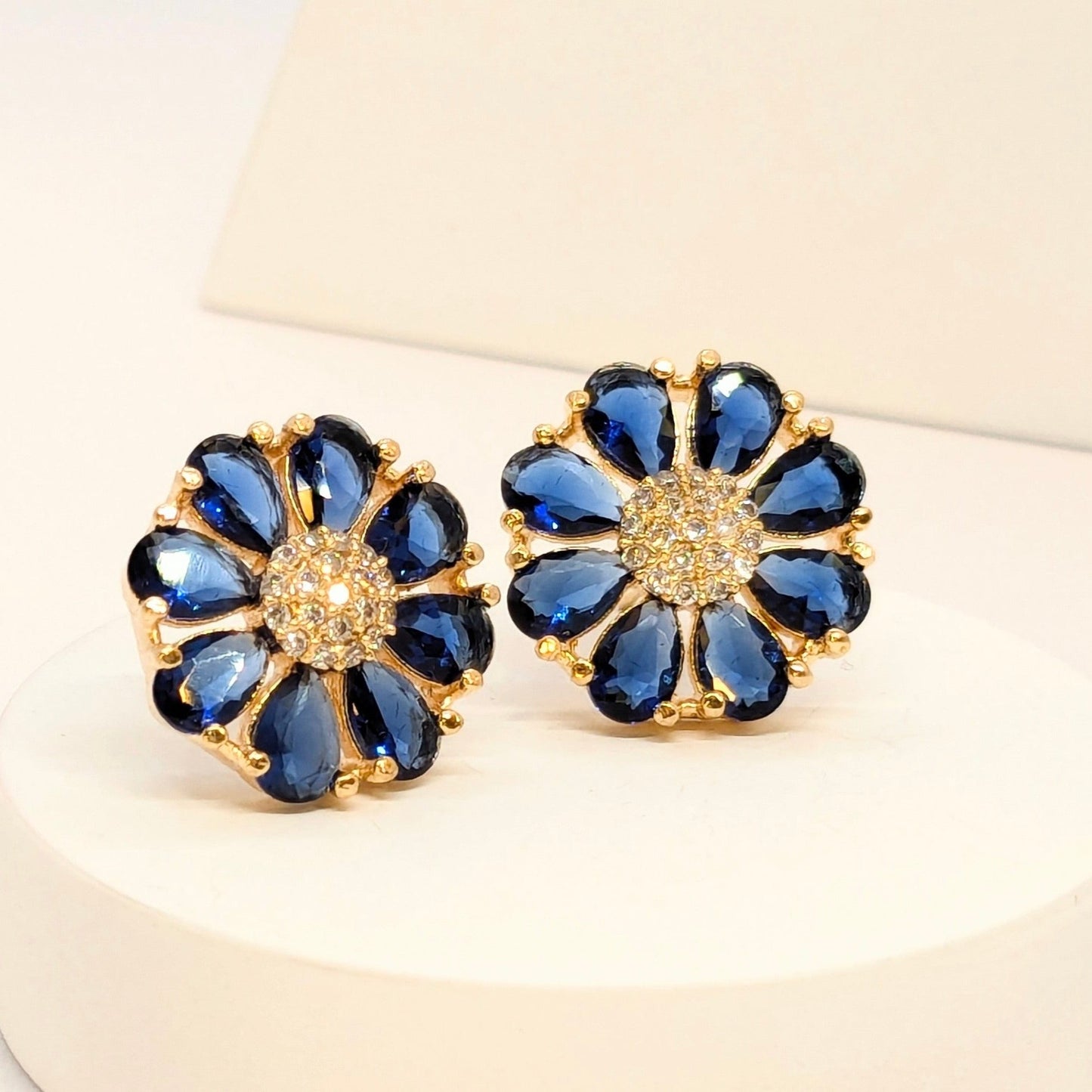 Fine Cut Navy Blue Stone Earring - Flower Pattern Studded with AD - Gold Finish