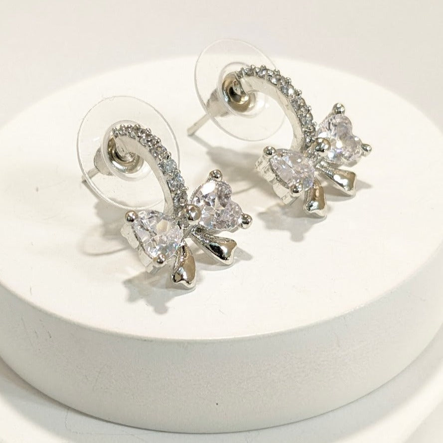 DIVA SERIES - Rhodium Plated Cubic Zirconia 5A Bow Hoop Earring