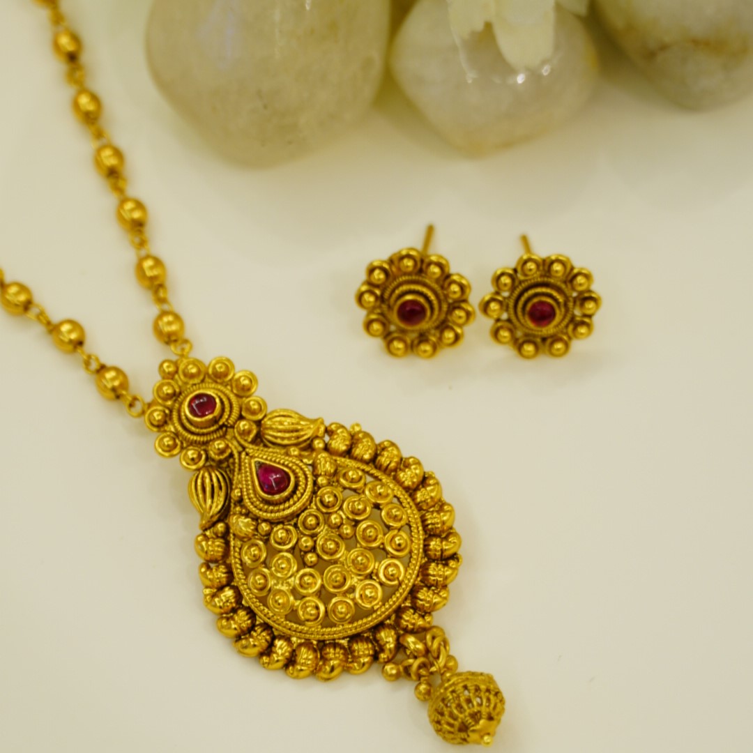 Elegant Tear Drop Shaped Ruby Studded Traditional Pure Brass Matte Gold Finish Pendant Set