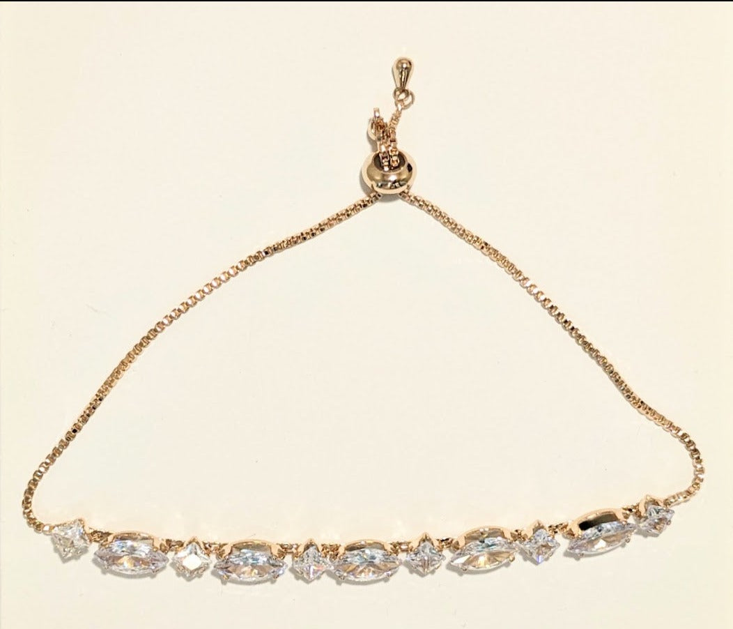 PRIMA DONNA SERIES - 5A Cubic and Eye Shaped Zirconia Rose Gold Plated Brass Linear Chain Bracelet