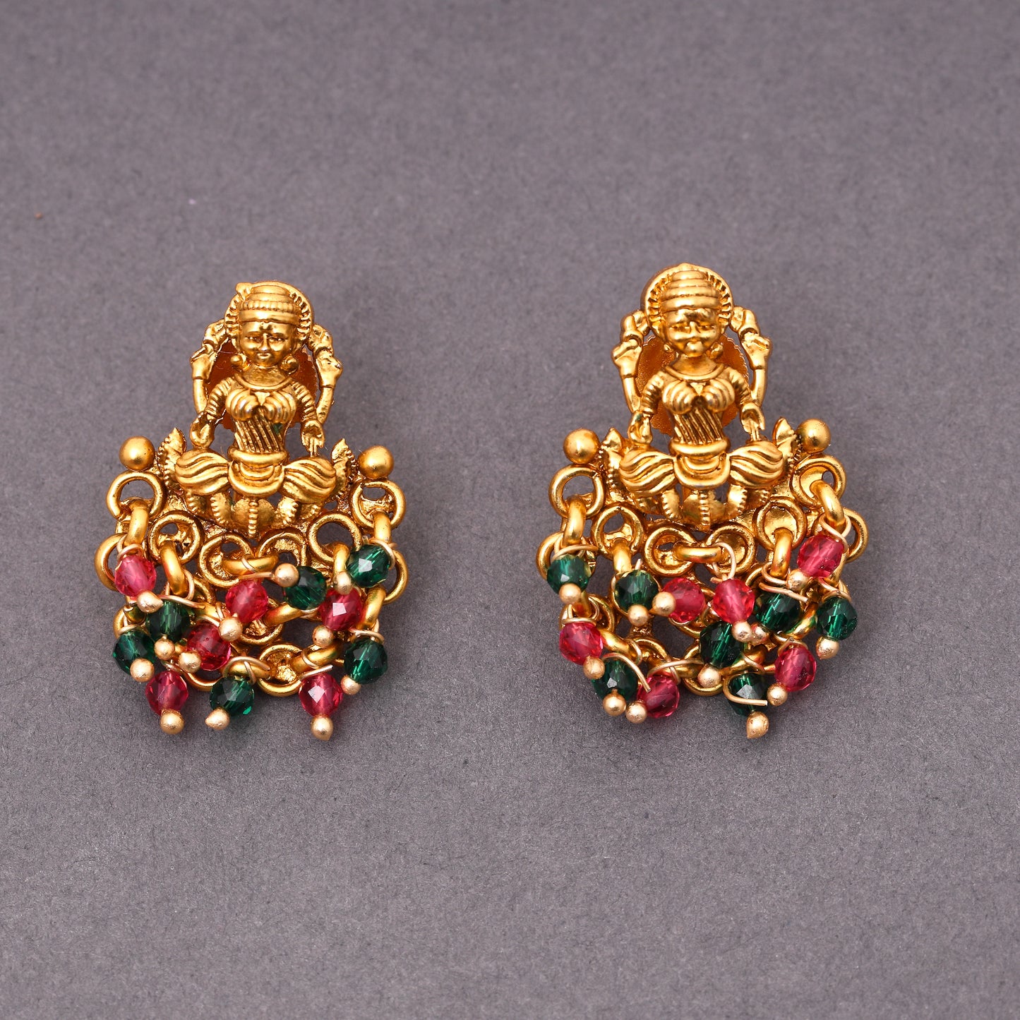 Traditional Temple Laxmi Studs in Brass 22KT Gold Plating Matte Finish studded with Red n Green Crystal Beads