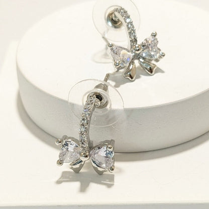 DIVA SERIES - Rhodium Plated Cubic Zirconia 5A Bow Hoop Earring