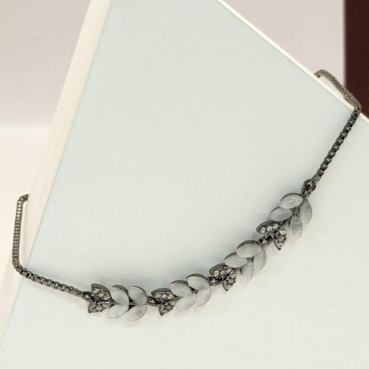 PRIMA DONNA SERIES - Leaf shaped White stones and 5A Zirconia Oxidized Brass Chain Bracelet